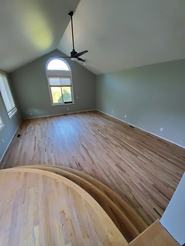 2-1/4" Red Oak with water-based finish 5 Red Oak flooring with water-based finish on curved steps and sunken room