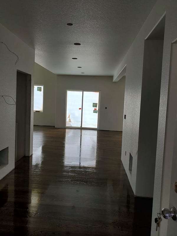 3-1/4 Red Oak stained driftwood with polyurethane finish 1 Red Oak stained driftwood with polyurethane finish in broad hallway facing sliding doors