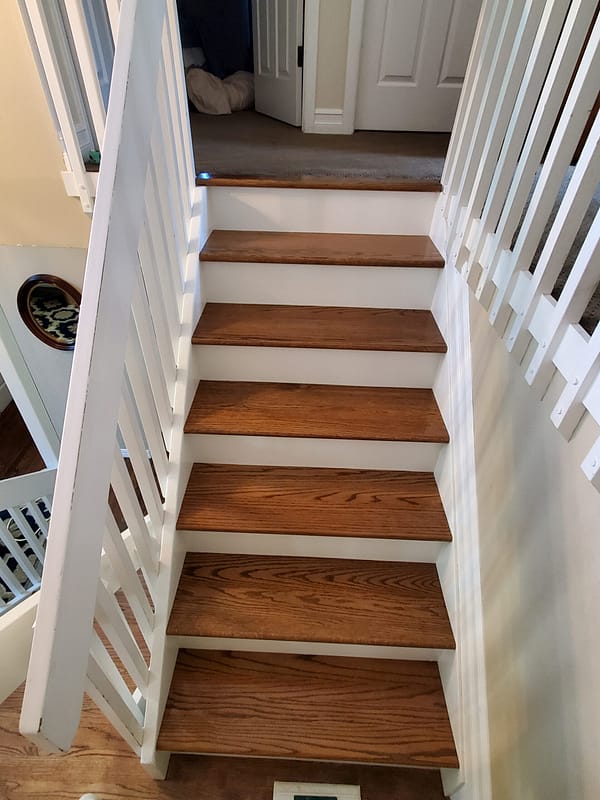 Red Oak stair treads stained Provincial Red Oak stair treads stained Provincial with white risers and railing