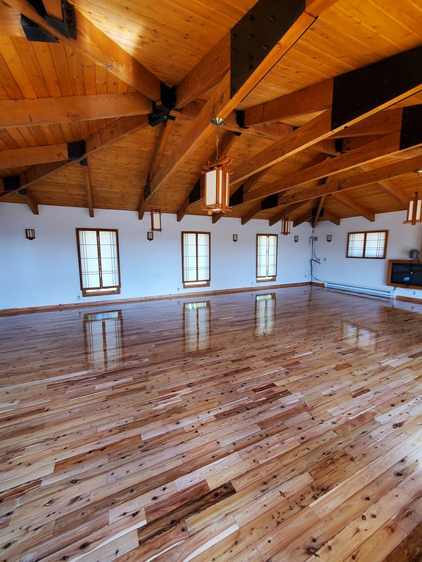Australian Cypress with natural finish 2 Australian Cypress flooring with natural finish in large room with vaulted rafters