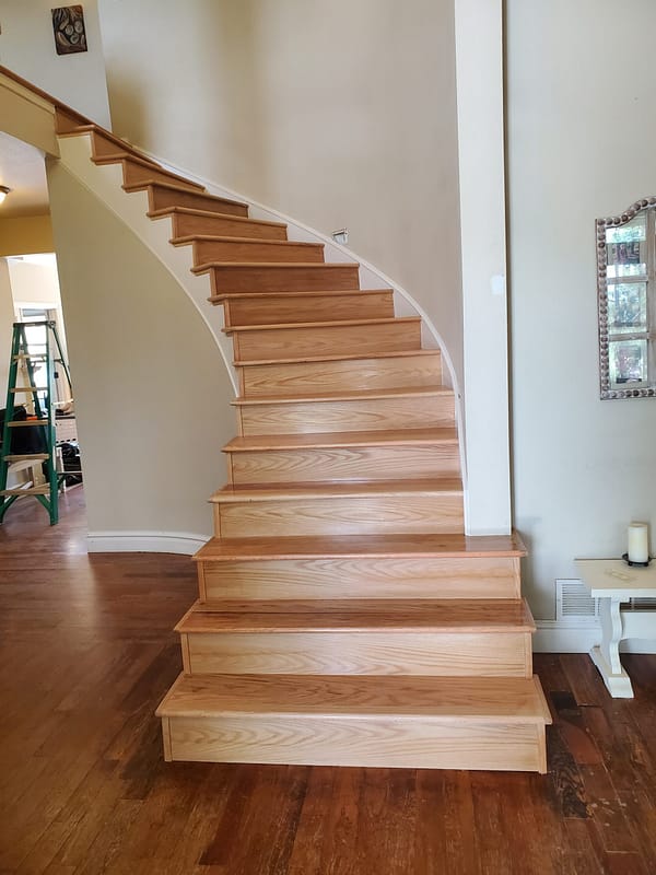 Red Oak treads and risers with natural finish 3 Red Oak treads and risers with natural finish on a curved staircase