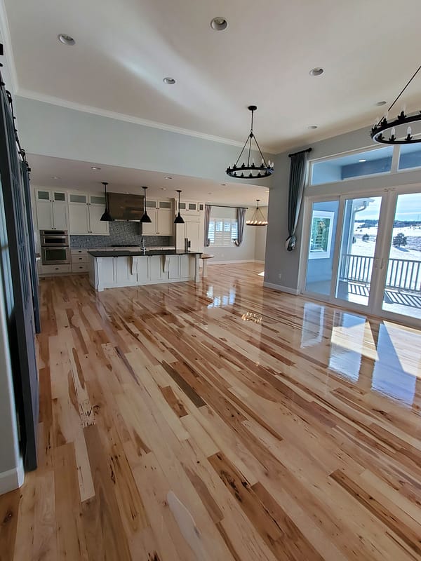 4" Natural Hickory with water-based finish 1 Natural Hickory flooring with water-based finish in modern kitchen and great room