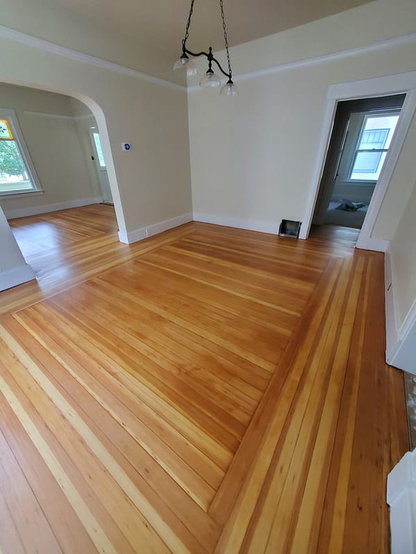 3" Fir with natural finish Log Cabin border 4 Fir flooring with natural finish and Log Cabin border with archway