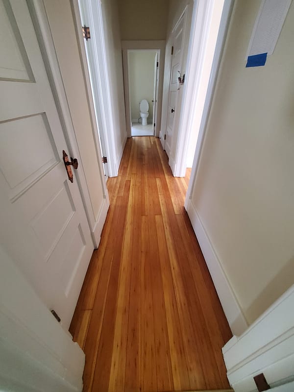 3" Fir with natural finish Log Cabin border 5 Fir flooring with natural finish in a hallway
