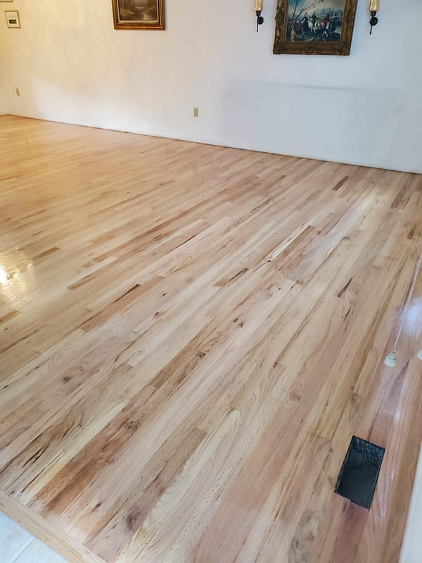 2-1/4" Red Oak with natural finish 1 Red Oak flooring with a natural finish in a living room and dining room