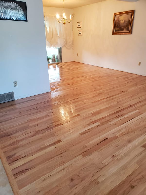 2-1/4" Red Oak with natural finish 2 Red Oak flooring with a natural finish in a living room and dining room