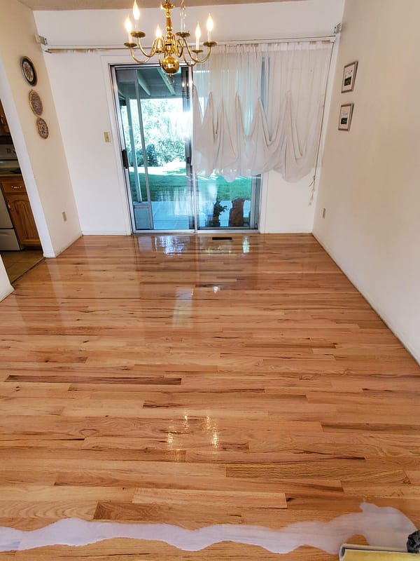 2-1/4" Red Oak with natural finish 3 Red Oak flooring with a natural finish in a living room and dining room
