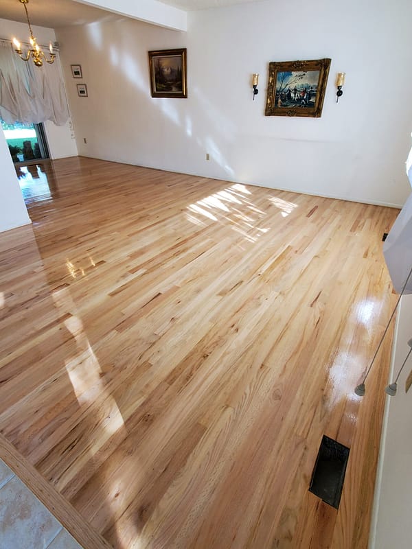 2-1/4" Red Oak with natural finish 4 Red Oak flooring with a natural finish in a living room and dining room
