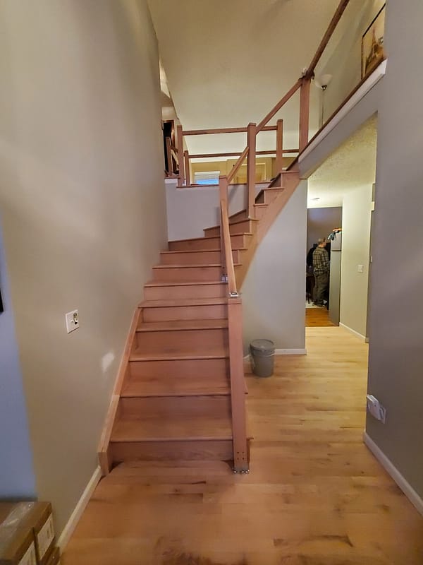 Red Oak stairs and risers with natural finish 1 Red Oak tread and risers with natural finish on twisting staircase