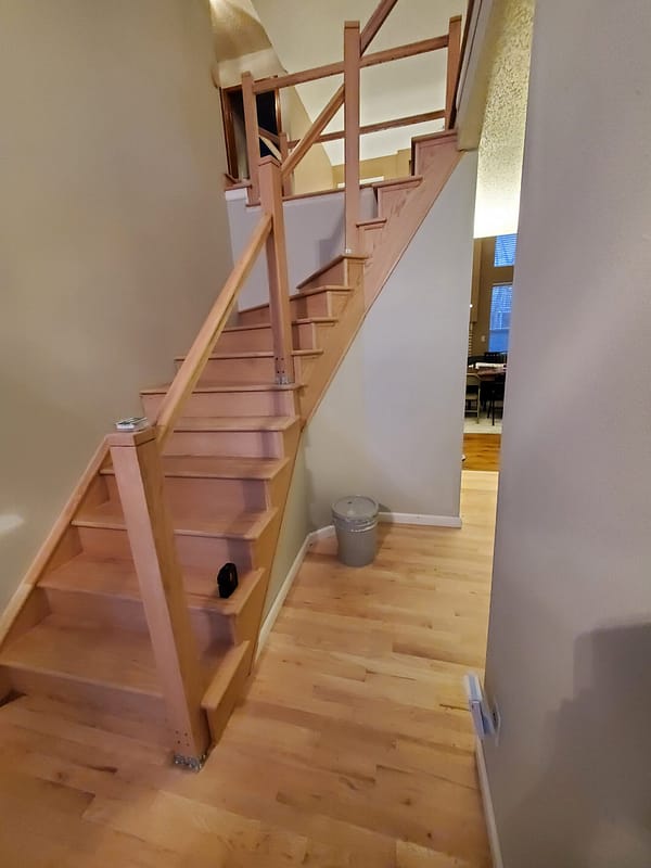 Red Oak stairs and risers with natural finish 2 Red Oak tread and risers with natural finish on twisting staircase