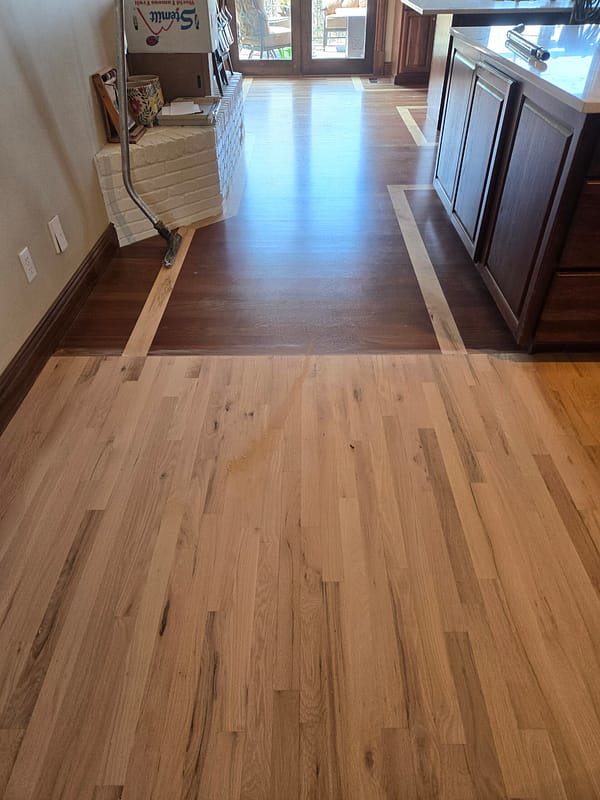 3-1/4" Brazilian Cherry with a Maple border inlay 1 Brazilian Cherry flooring with varying tones and a Maple border inlay