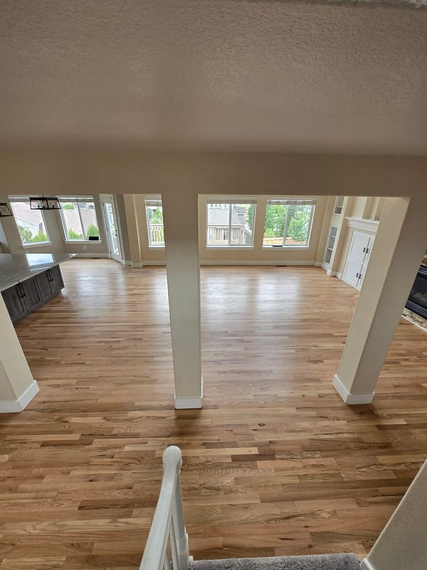 2-1/4" Red Oak with natural finish 2 Red Oak flooring with natural finish with in great room with columns